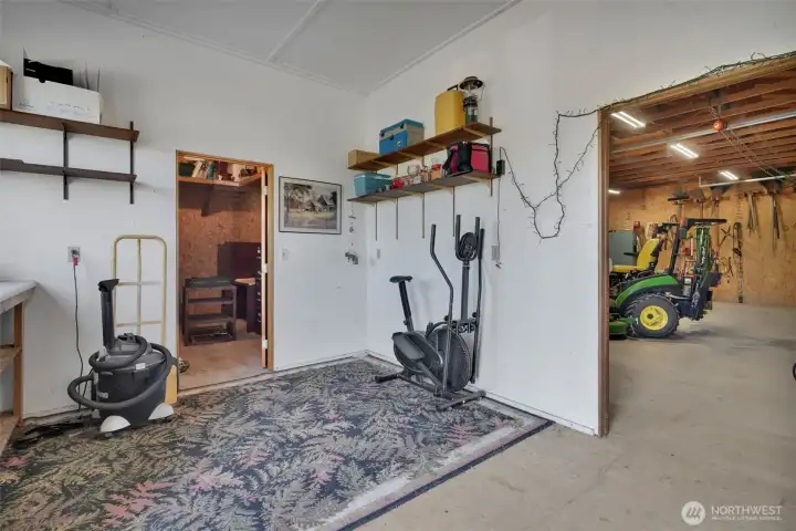 Inside shop entrance with view of storage room, room for hobbies!