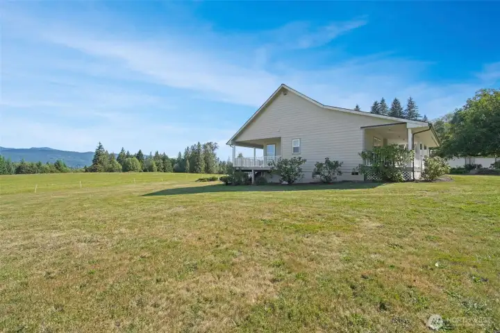 Side of home with mountain views