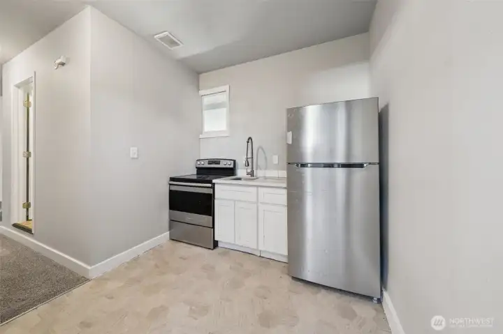 Kitchen 2 on the main level. Located outside bedrooms 3 and 4.