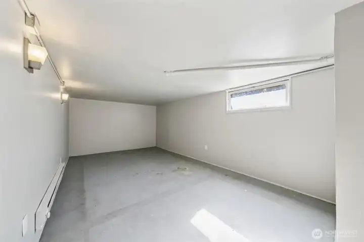 Another basement room used as a bedroom.