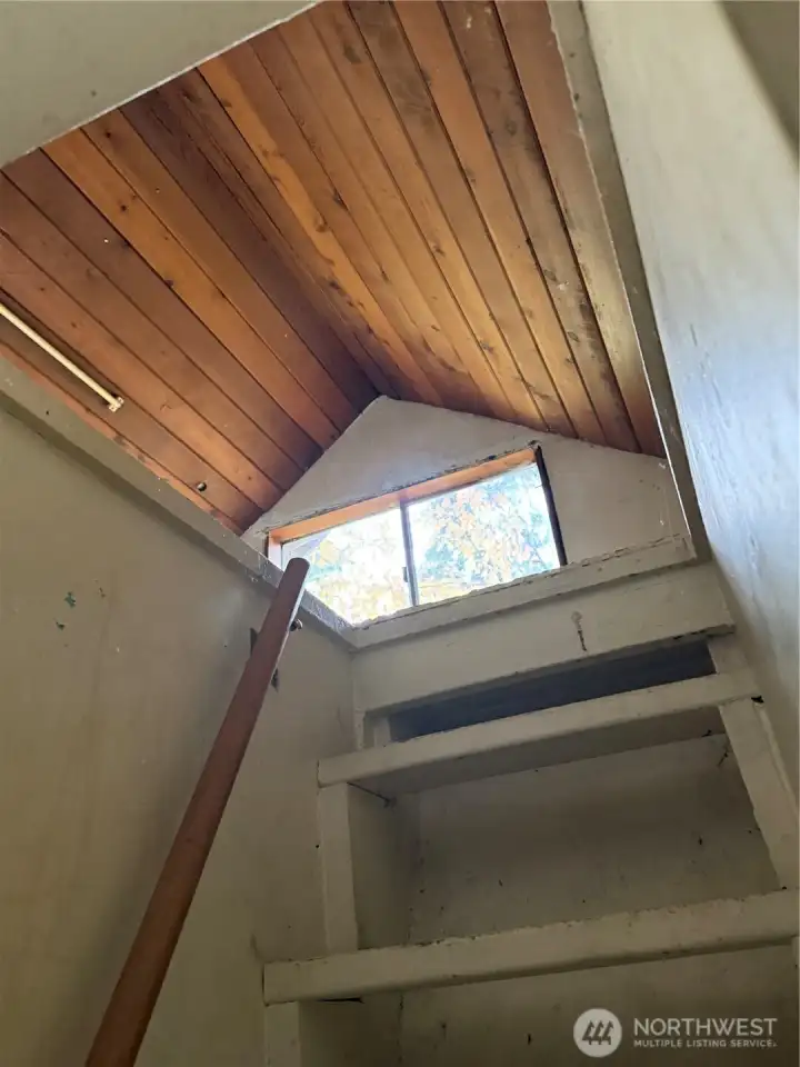 There is a small loft above the bedroom.