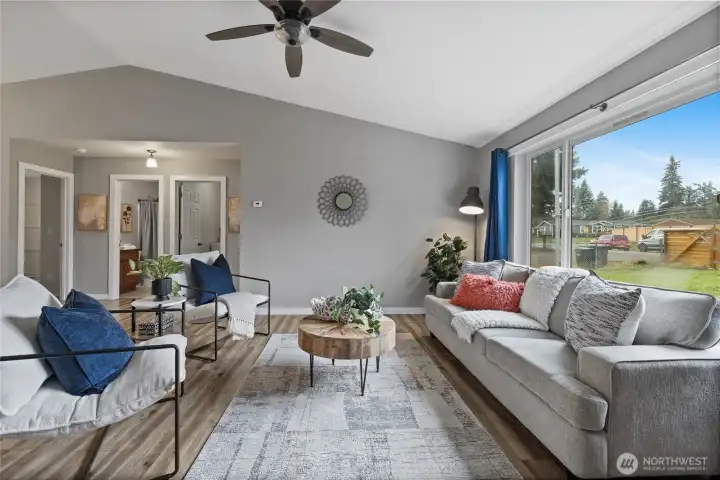 Cozy up in your beautiful living room, with vaulted ceilings