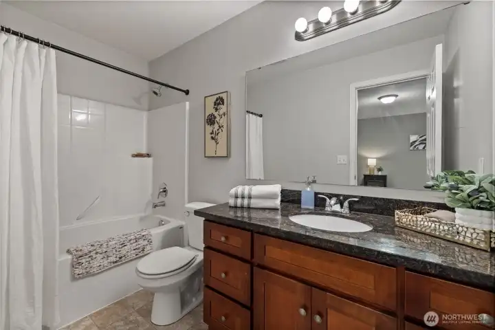 Full primary bathroom features plenty of counter space - a great feature to have!