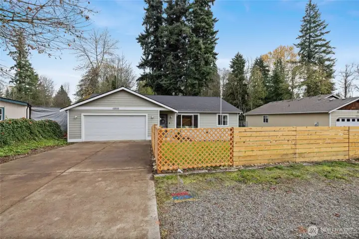 Long driveway leads to two car heated garage!