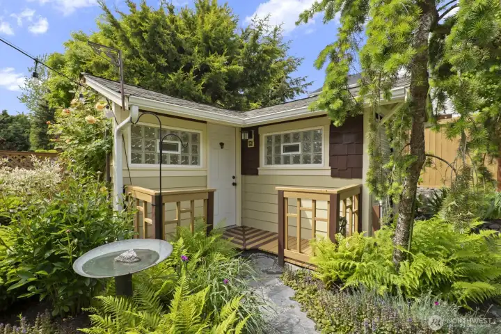 ...with the most awesome garden shed/ she-shed combo...it has both!