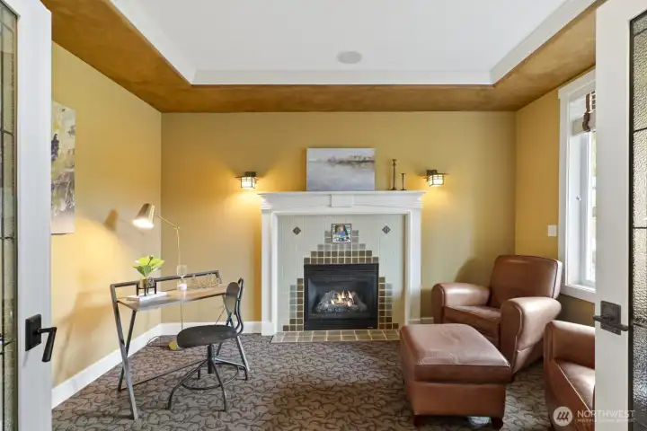 Right inside...the ideal home office w/ fireplace!