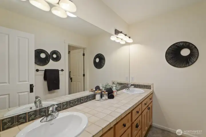 The upstairs bathroom...with its own water closet and shower/ tub.