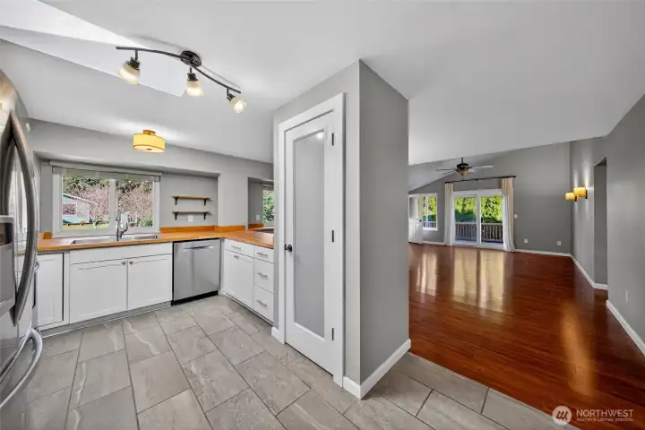 Kitchen includes a skylight and pantry.