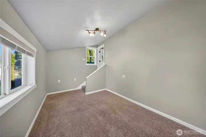 Versatile bonus space ideal for a home office, hobby room, or guest retreat.