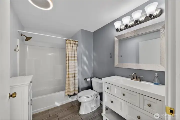 Tastefully finished bathroom with clean, timeless design.