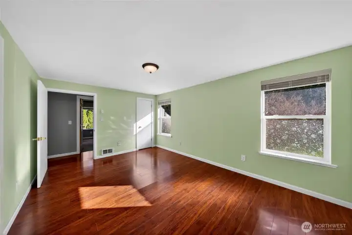 Primary bedroom features an extra closet.