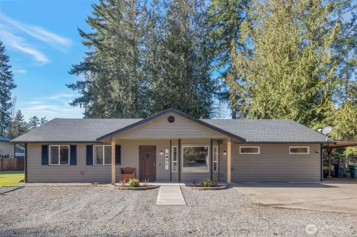 Beautiful 3-bedroom, 2.25 bath home sitting on fully useable 1.58 acres. This is a must see!! This home has it all! Endless parking, large shop, chicken coop, outdoor covered bbq area, outbuildings and more.