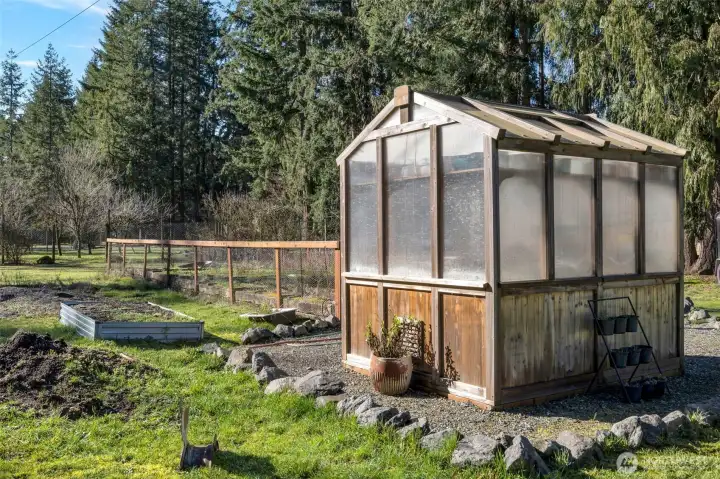 Green house with garden area