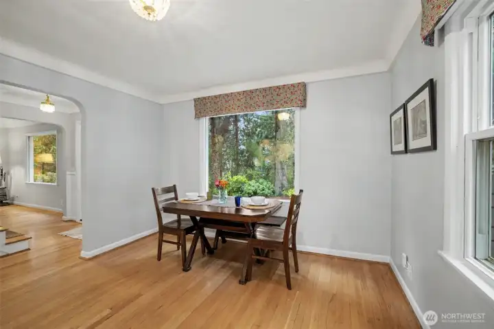 The dining room has a serene green lush view to enjoy while you dine.