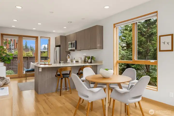 Plenty of room for a dedicated dining area plus a spacious sit-up countertop in the kitchen.