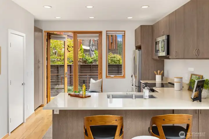 The private deck and patio through the backdoor is a perfect place to enjoy morning coffee.