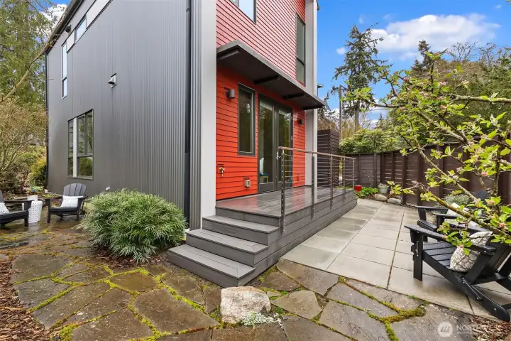 The new deck leads you to back and side patios with excellent privacy and sunlight.