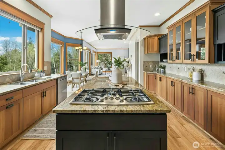 With a spacious island and extensive storage you'll have plenty of room to work while enjoying the views from the deck, or relaxing in the living room.