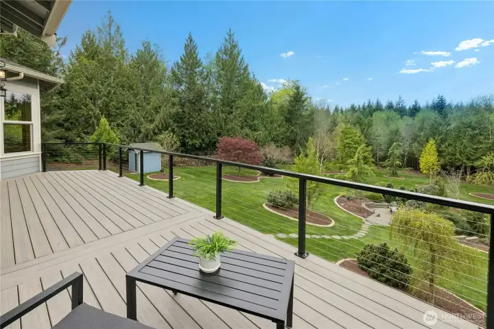 The oversized 'Trex' deck is a great spot to soak up the sun and take in the property. There is plenty of room here for a dinner party.
