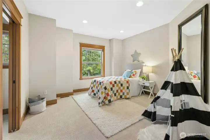 The upper level features new, never-lived-in carpeting. The second bedroom is also upstairs with a large walk-in closet.