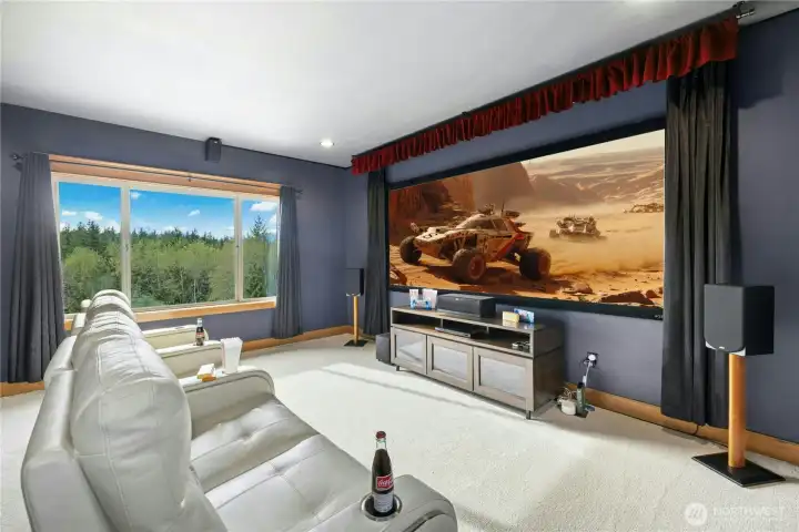 Enjoy your very own home theater, located on the upper level. Perfect for movie nights, gaming, or hosting the Sunday game.