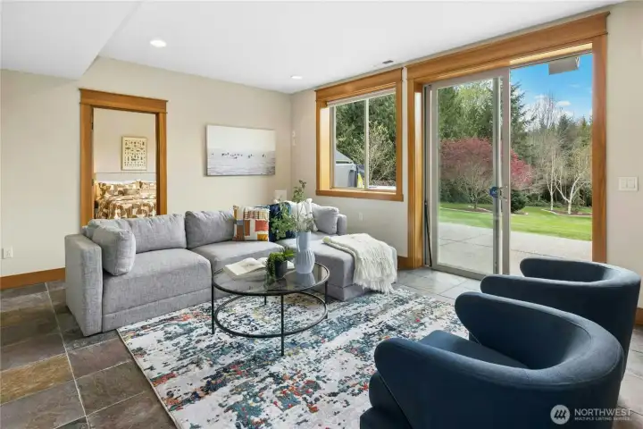 The private family room on the lower level offers another space for relaxing, homework or games.