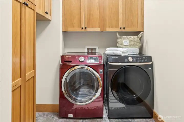 Enjoy the flexibility of two laundry areas.  There are hook-ups in the upper level hallway closet to add a second washer and dryer and this set is already in the dedicated lower level laundry room with abundant storage.