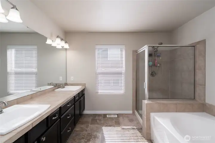 Primary Bath with dual vanity, tub and walk in shower