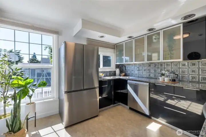 Updated kitchen has stainless steel appliances