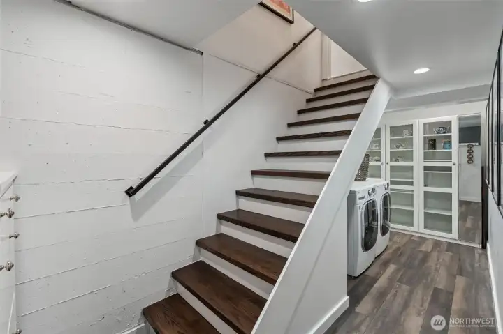 Door at top of stairs for separation.