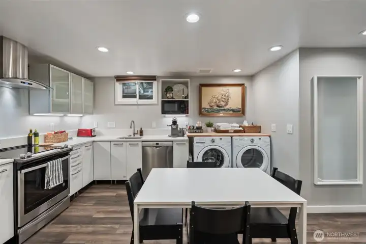 ADU full-sized kitchen with dining area.