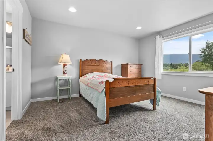 Primary bedroom is spacious with the en-suite 3/4 bath to the left