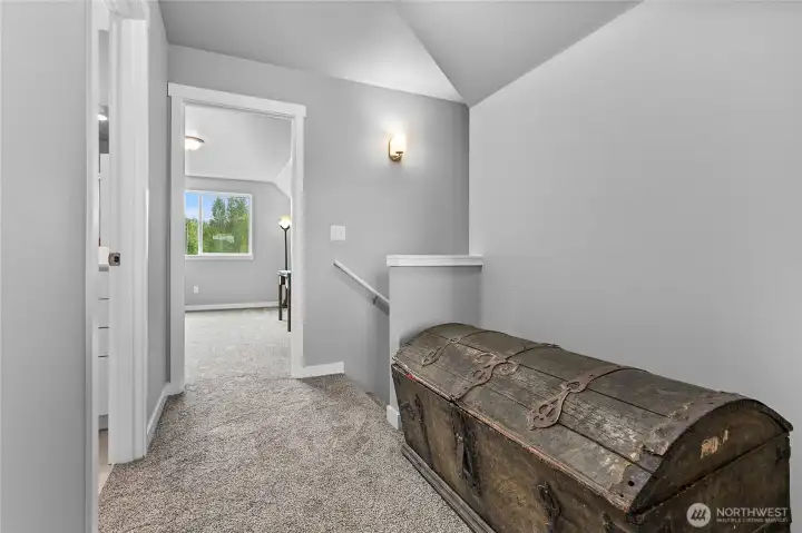 Upstairs landing with nook area. Whole bathroom sits between the two bedrooms upstairs.