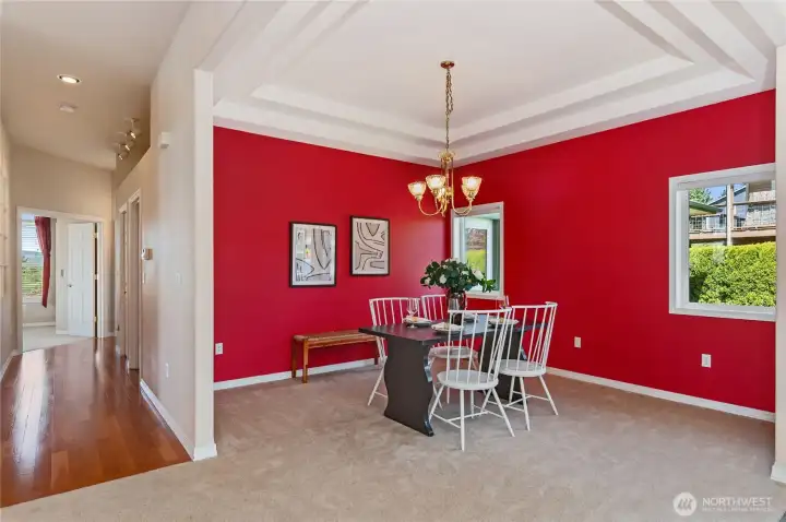 Formal dining features coffered ceilings.