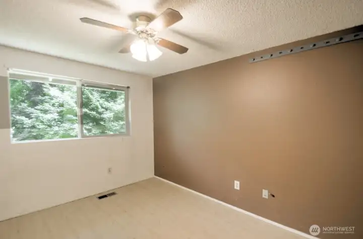 Large bedroom with ceiling fan