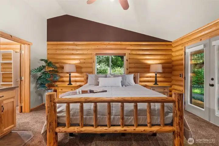 Primary suite with French doors out to the hot tub