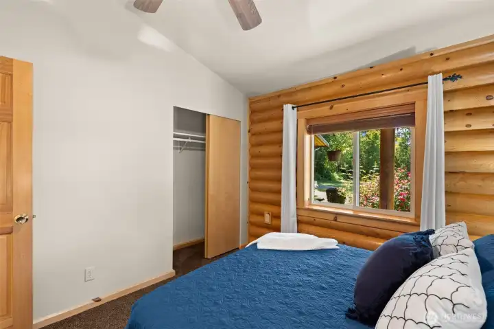 Bedroom number two with views of the back and mountains