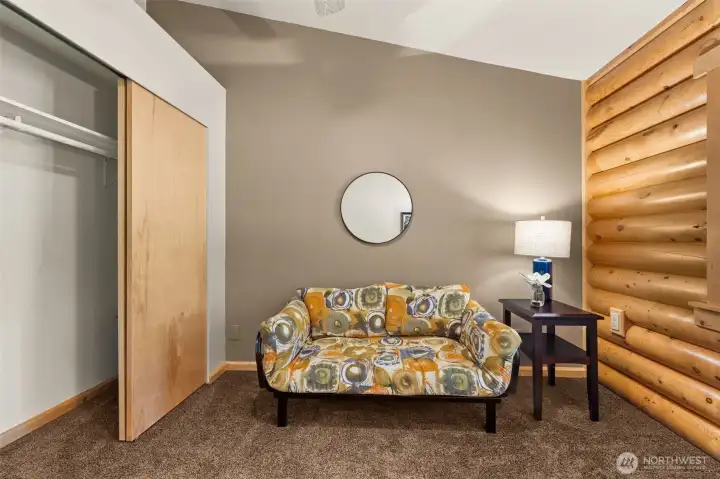 Bedroom number three currently used as an office with views of the front yard