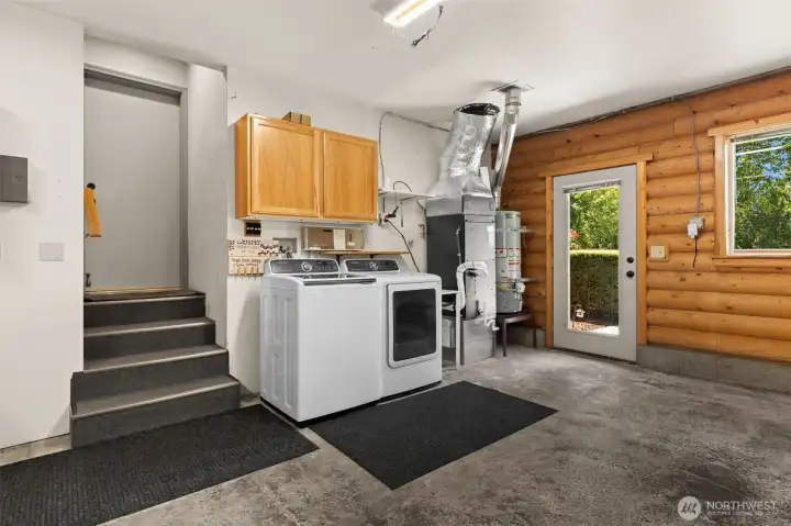 Laundry area at the end of the hall in the garage