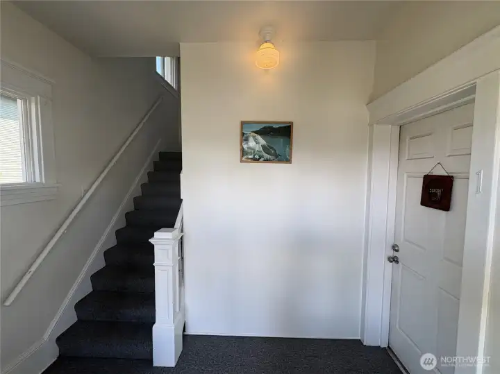 Secure, common entrance to units 1-3