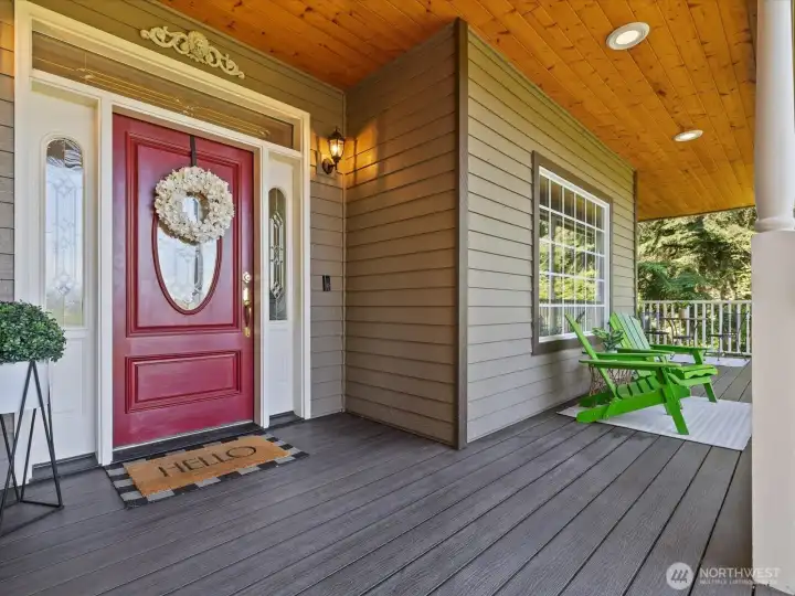Covered large patio with trex deck. Access to formal dining room through french doors