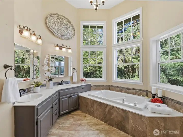 Soak in your jettet tub and enjoy privacy and views. Double sink and additional closet
