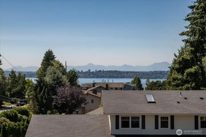 Enjoy the view of Lake Washington and the Olympic mountains from upper level