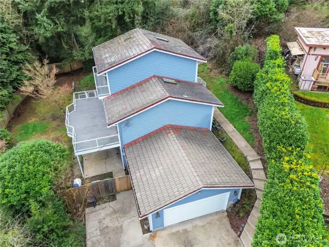 Highly accommodating home has two complete and independent living areas - great for rental income or multi-generational needs. HUGE deck spaces on main living area plus a private lanai on the upper (primary suite) level.