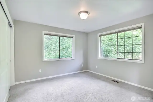 2nd bedroom on main floor. Love the corner light.
