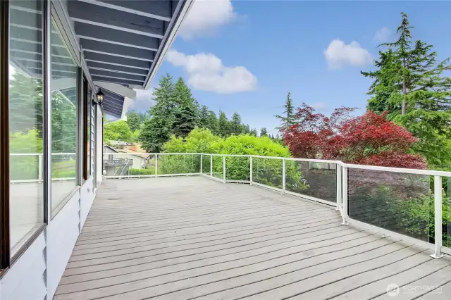 Check out that deck!! Trex material and lovely plexiglass rails to preserve the territorial, mountain range and Mt Rainier view (not shown here, but you DO have that view (more to the right of this shot).