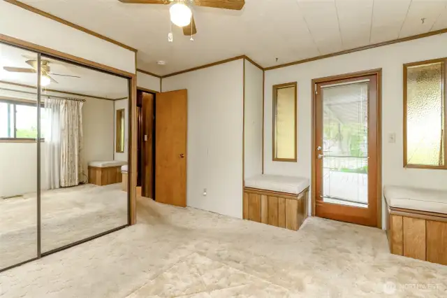 Primary Bedroom with door to back deck
