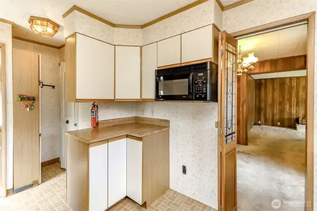 Kitchen with Washer/Dryer behind