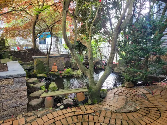 Beautiful, well maintained pond with waterfall and mature trees. The fish love visitors, don't forget to say hello.