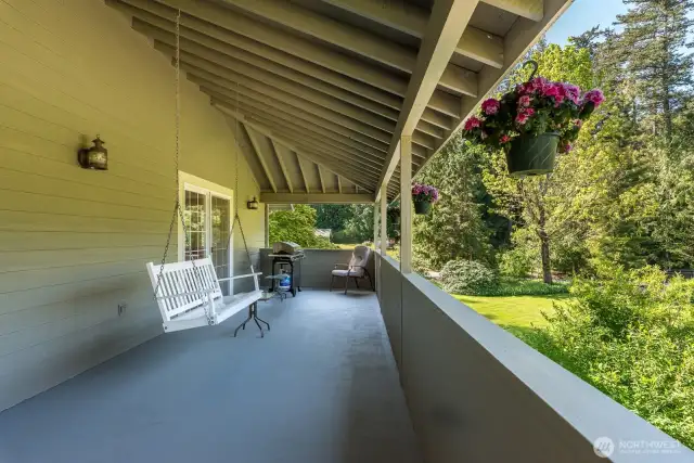 Lovely covered deck on the main level for year-round enjoyment!